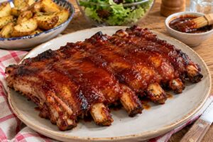 Costine speziate con salsa barbecue in friggitrice ad aria